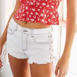 Forever 21 white denim lace up side shorts.